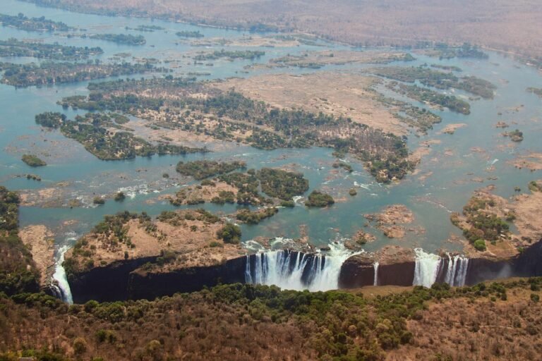 Aerial view of the Zambezi River and Victoria Falls with the gorges beyond