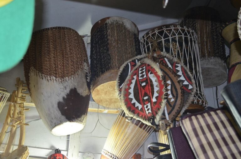 Carved and painted African drums