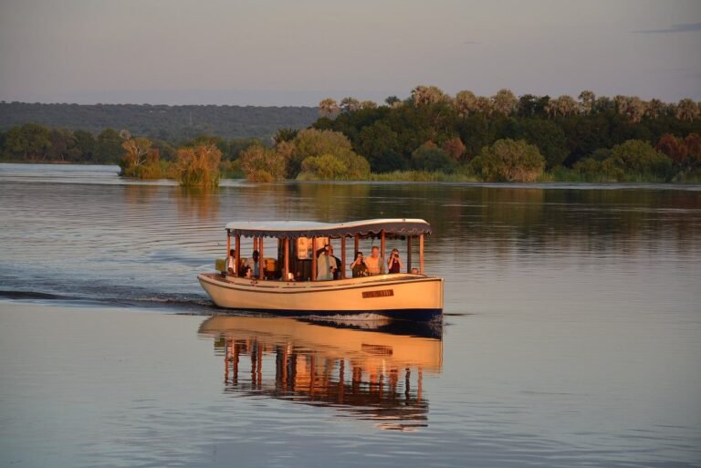 River cruise boat on the Zambezi at golden hour